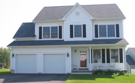 Samuel's Crossing of Plainville, By Carrier Homes, New Home Builder in CT, Mastic White siding with Cedar impression