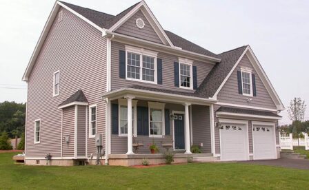 Samuel's Crossing of Plainville, By Carrier Homes, New Home Builder in CT, Mastic Harbor Gray siding with Cedar impression
