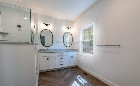 The Orchards, New Homes East Lyme, CT, New Community, Custom Built, By Carrier Homes, Vertical Stacked Subway Tile, Moen Fixtures, Grantie Vanity, Primary Bathroom, Herringbone Tile, Wood
