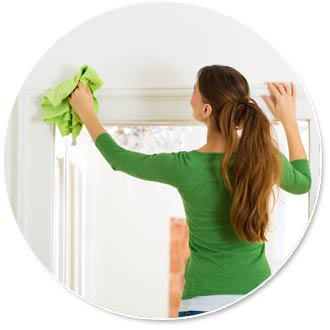 woman cleaning wall 